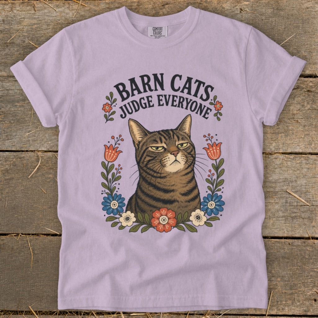 Lilac Comfort Colors t-shirt with graphic "Barn Cats Judge Everyone" and a judging tabby cat.
