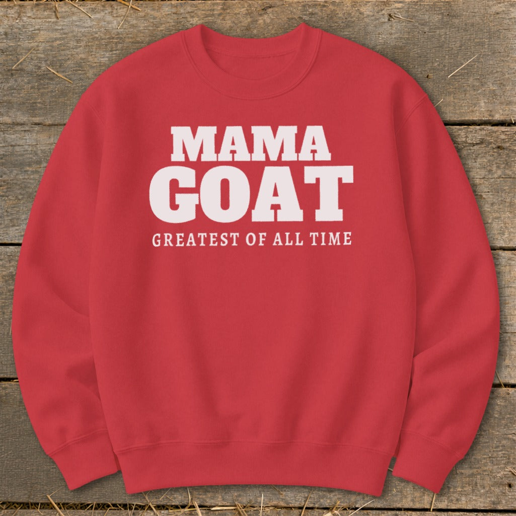 Red sweatshirt with "MAMA GOAT GREATEST OF ALL TIME" text.