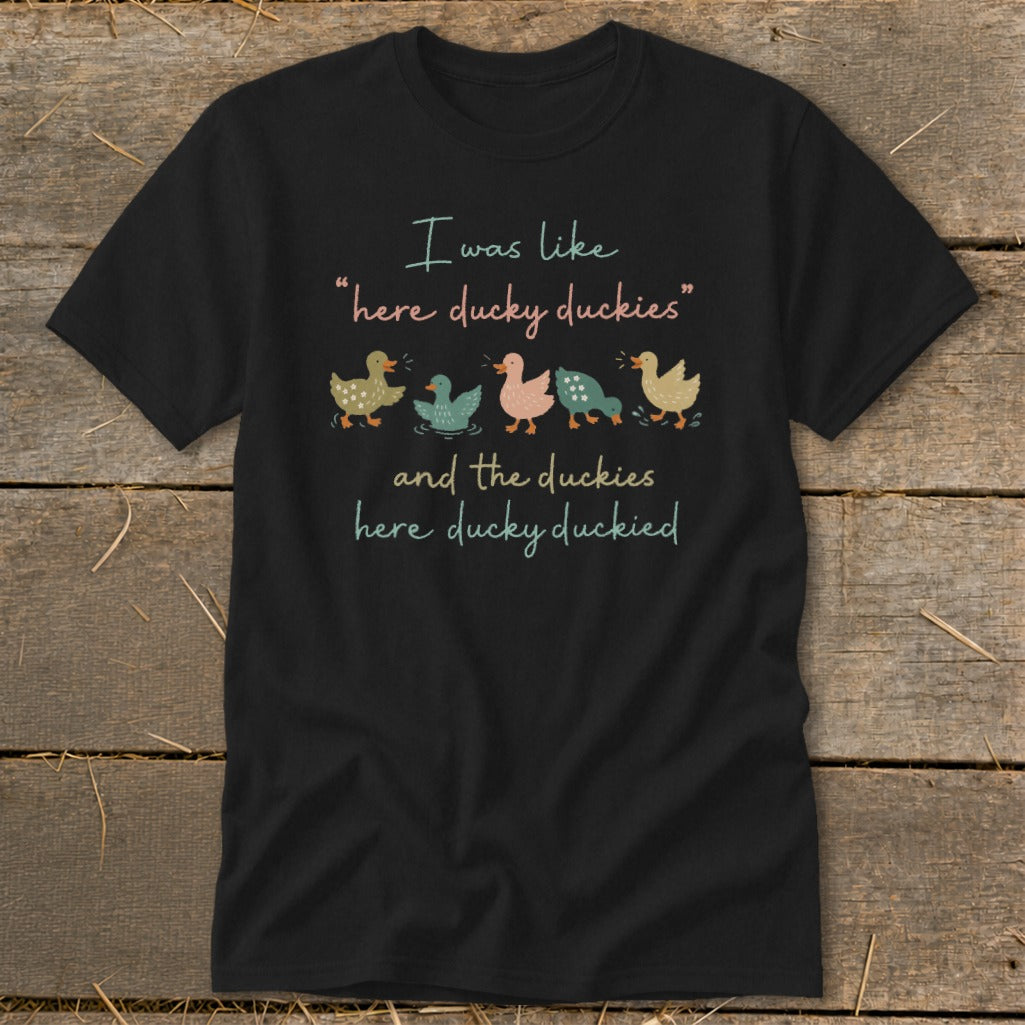 Black t-shirt with ducks and text: "I was like 'here ducky duckies' and the duckies here ducky duckied."