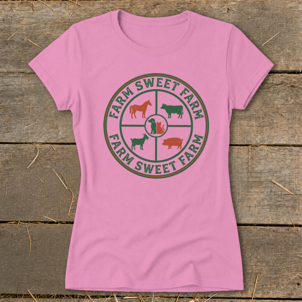 Pink t-shirt with a circular graphic of farm animals and "Farm Sweet Farm" text.
