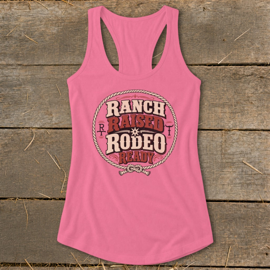 Pink tank top with "Ranch Raised Rodeo Ready" text inside a rope circle.