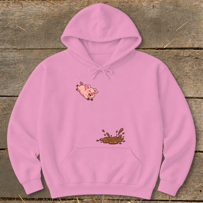 Pink hoodie with a cartoon pig jumping in a mud puddle graphic.