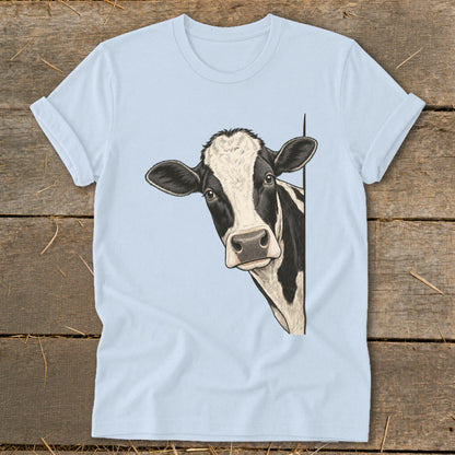 Light blue t-shirt with a black and white cow peeking from the side.