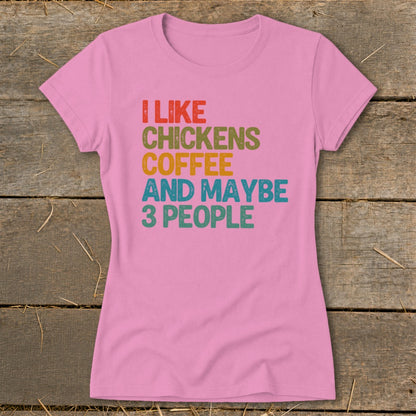 Pink t-shirt with "I like chickens coffee and maybe 3 people" text.