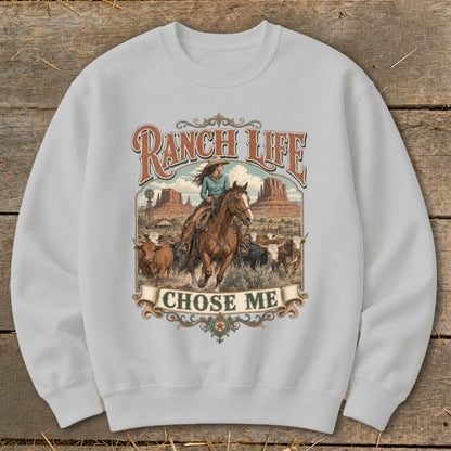 Light gray sweatshirt with "RANCH LIFE CHOSE ME" text and cowboy riding horse with cattle.