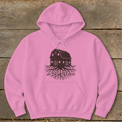 Pink hoodie with dark brown barn graphic and text "MY ROOTS RUN DEEP".