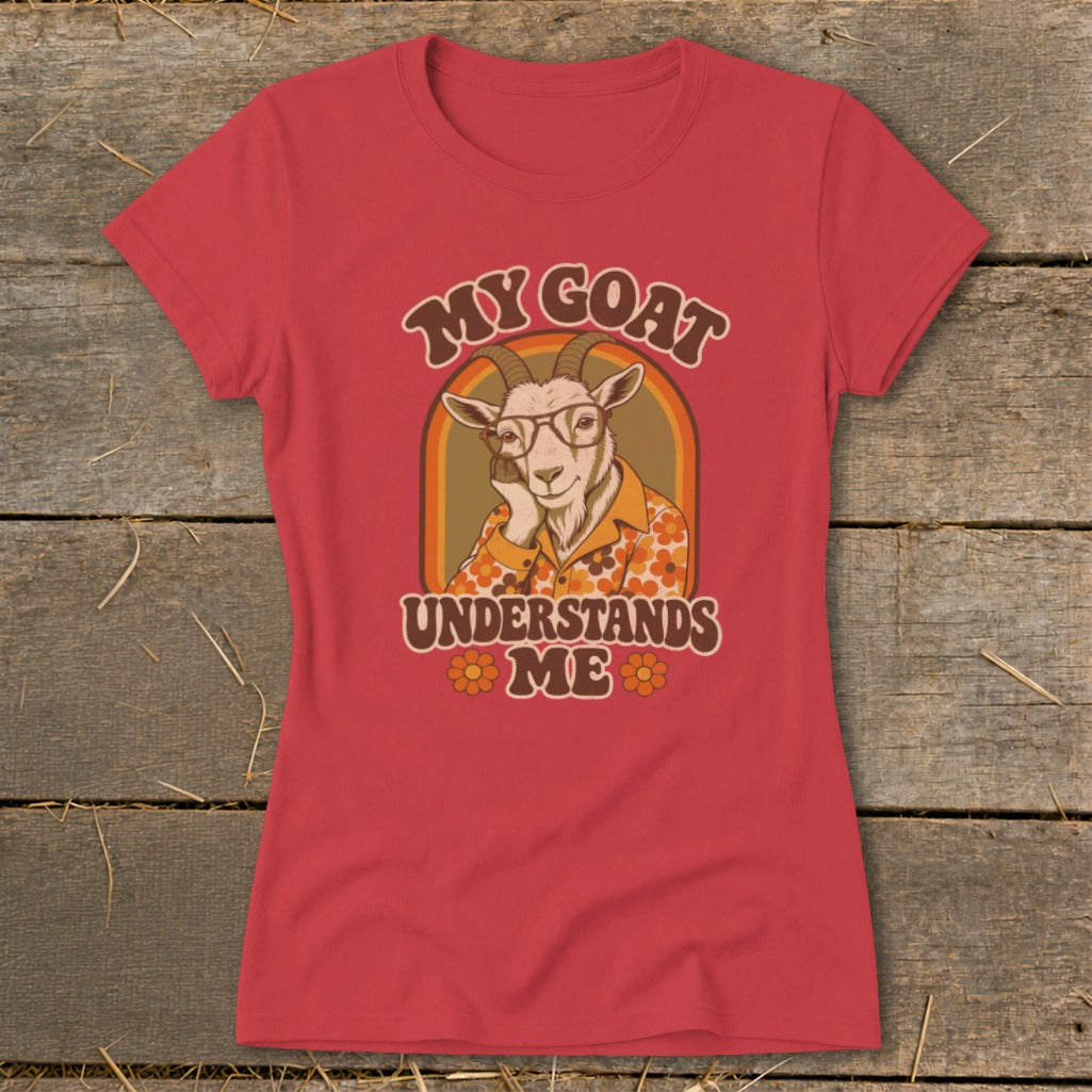 Red t-shirt with a graphic of a goat wearing glasses and a floral shirt, reading "MY GOAT UNDERSTANDS ME".