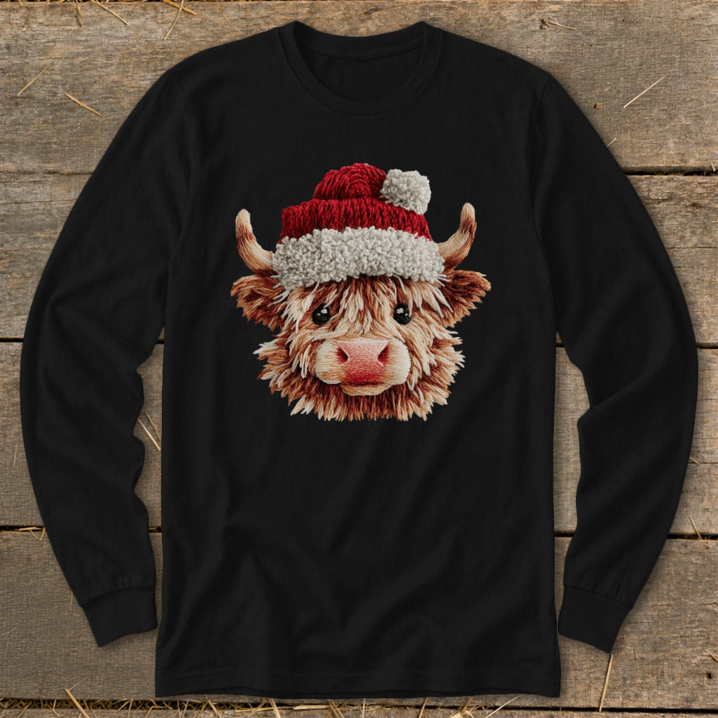 Long-sleeve black shirt with a Highland cow wearing a Santa hat graphic.