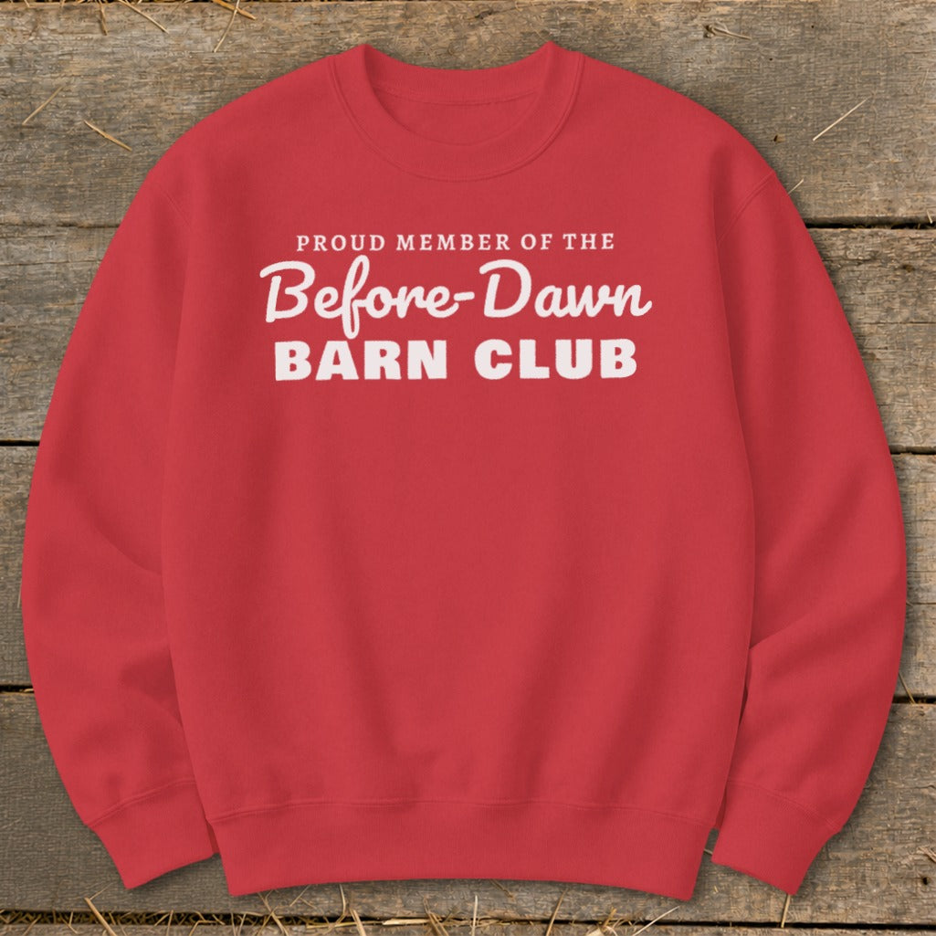 Red crewneck sweatshirt with white text "PROUD MEMBER OF THE Before-Dawn BARN CLUB".
