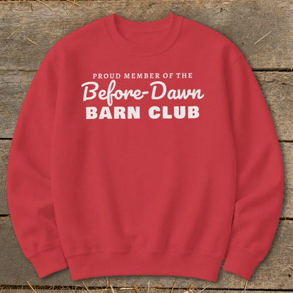 Red crewneck sweatshirt with white text "PROUD MEMBER OF THE Before-Dawn BARN CLUB".