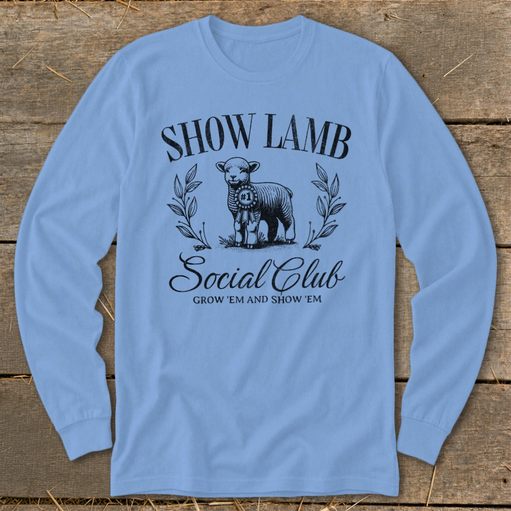 Light blue long sleeve shirt with "SHOW LAMB Social Club" text and a lamb graphic.