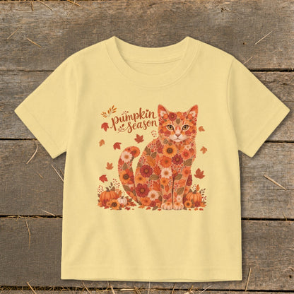 Cat wearing a floral outfit with pumpkins and "pumpkin season" text.