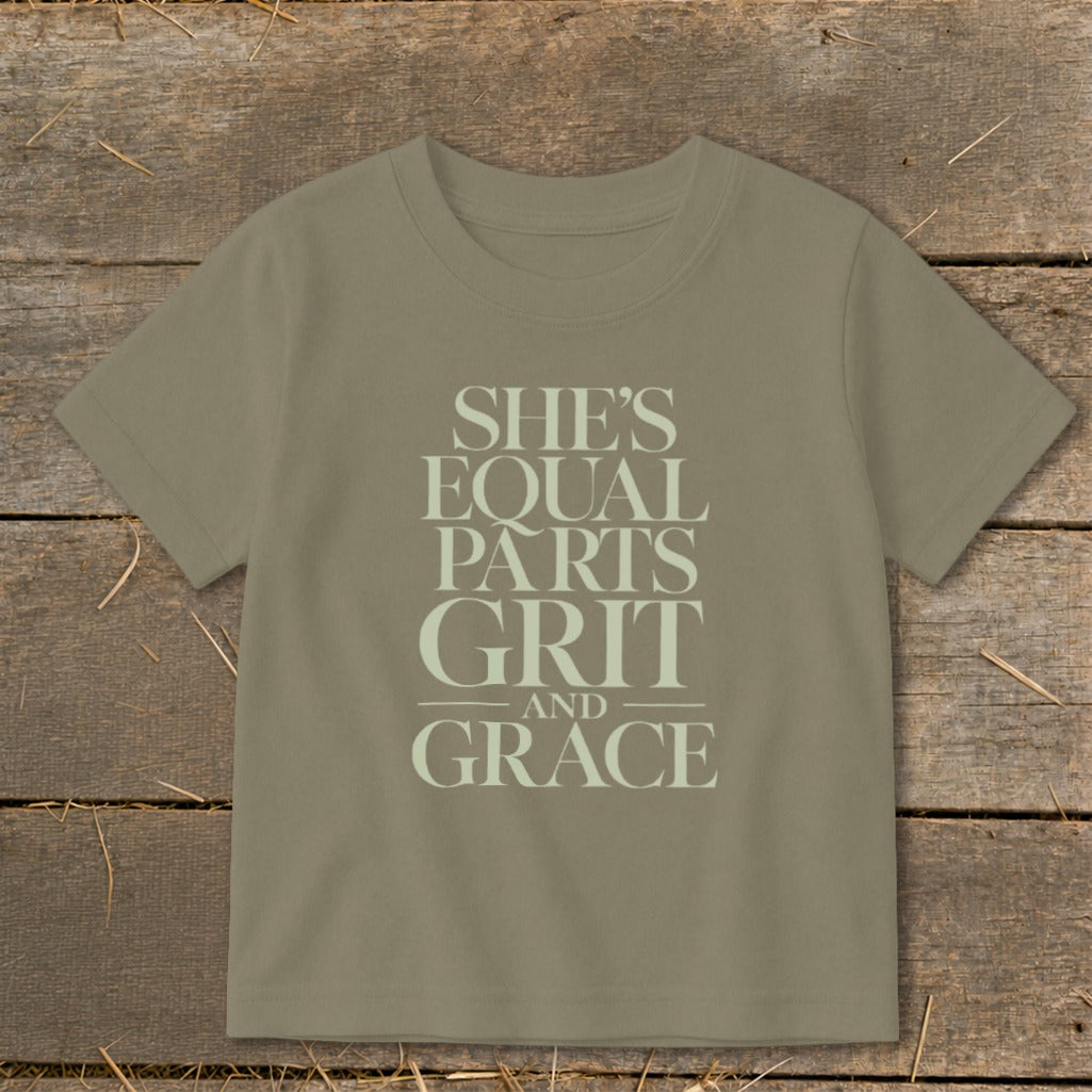 T-shirt with text "She's Equal Parts Grit And Grace".