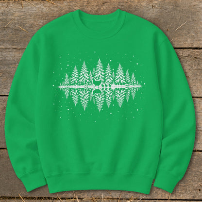 Green crewneck sweatshirt with white pine trees and deer reflection graphic.