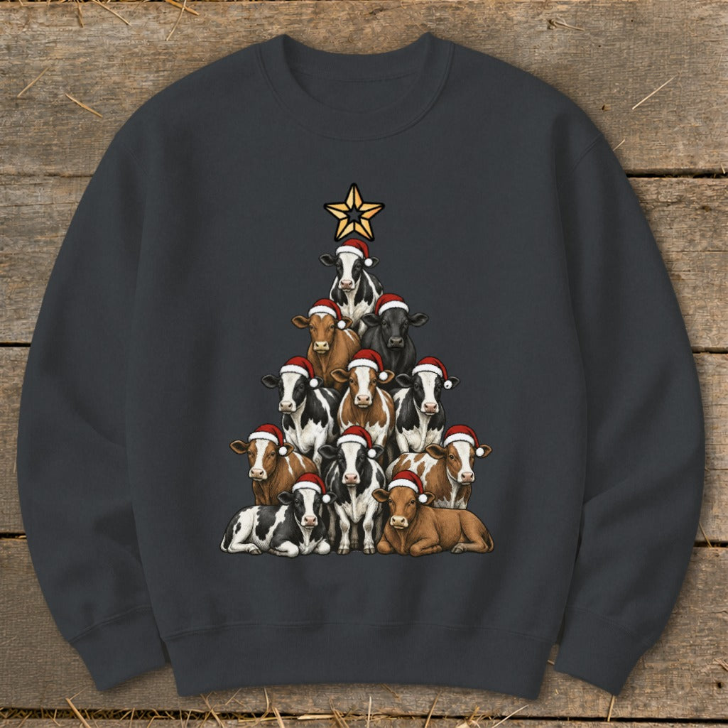 Christmas tree made of cows wearing Santa hats, topped with a star.