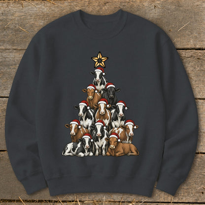 Christmas tree made of cows wearing Santa hats, topped with a star.