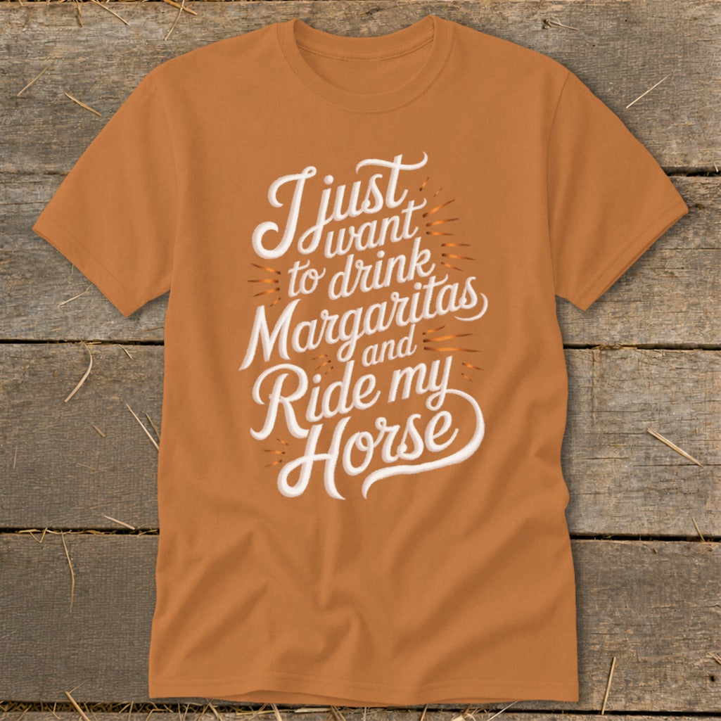 Orange t-shirt with white text saying "I just want to drink Margaritas and Ride my Horse".
