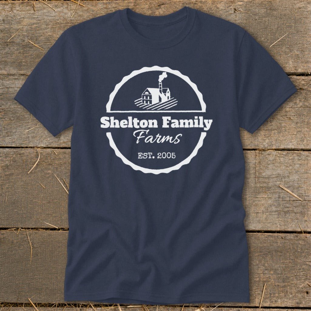 Navy t-shirt with "Shelton Family Farms EST. 2005" logo and farm graphic.