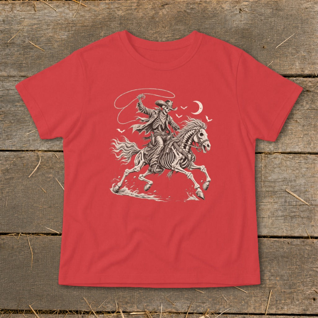 Skeleton cowboy on skeletal horse with lasso, bats, and moon design on red t-shirt.