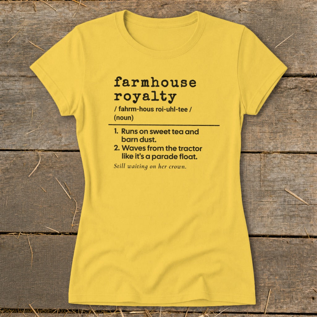 Yellow t-shirt with "farmhouse royalty" definition printed on it.