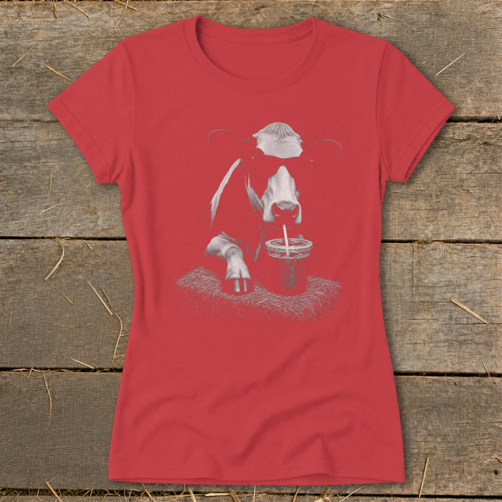 Red t-shirt with a graphic of a cow wearing sunglasses, drinking from a straw.