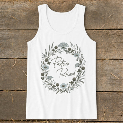 White tank top with floral wreath graphic and "Pasture Raised" text.