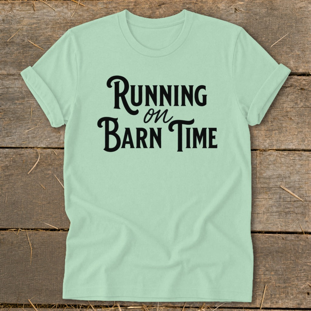 Mint t-shirt with black text reading "Running on Barn Time".