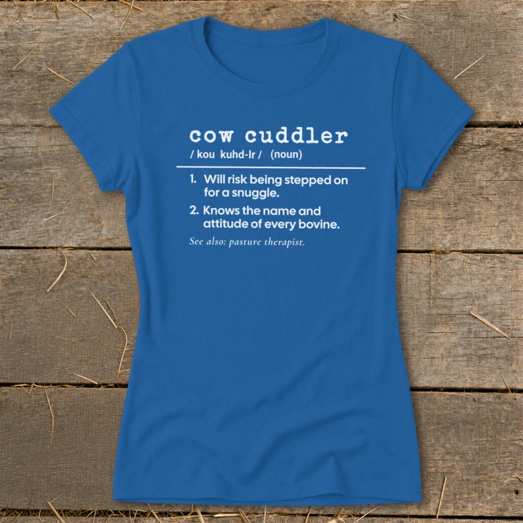 Blue t-shirt with "cow cuddler" definition and humor.