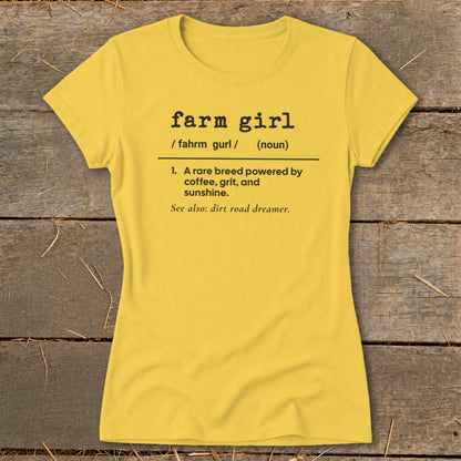 Yellow t-shirt with "farm girl" definition: powered by coffee, grit, and sunshine.