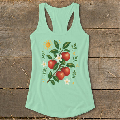 Mint green tank top with apple branch, flowers, and sun graphic.