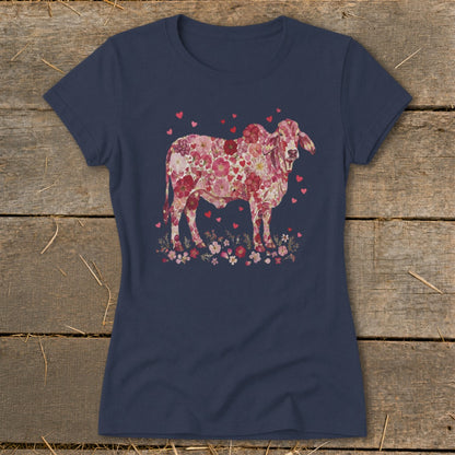 Navy t-shirt with a pink floral cow and heart graphic.