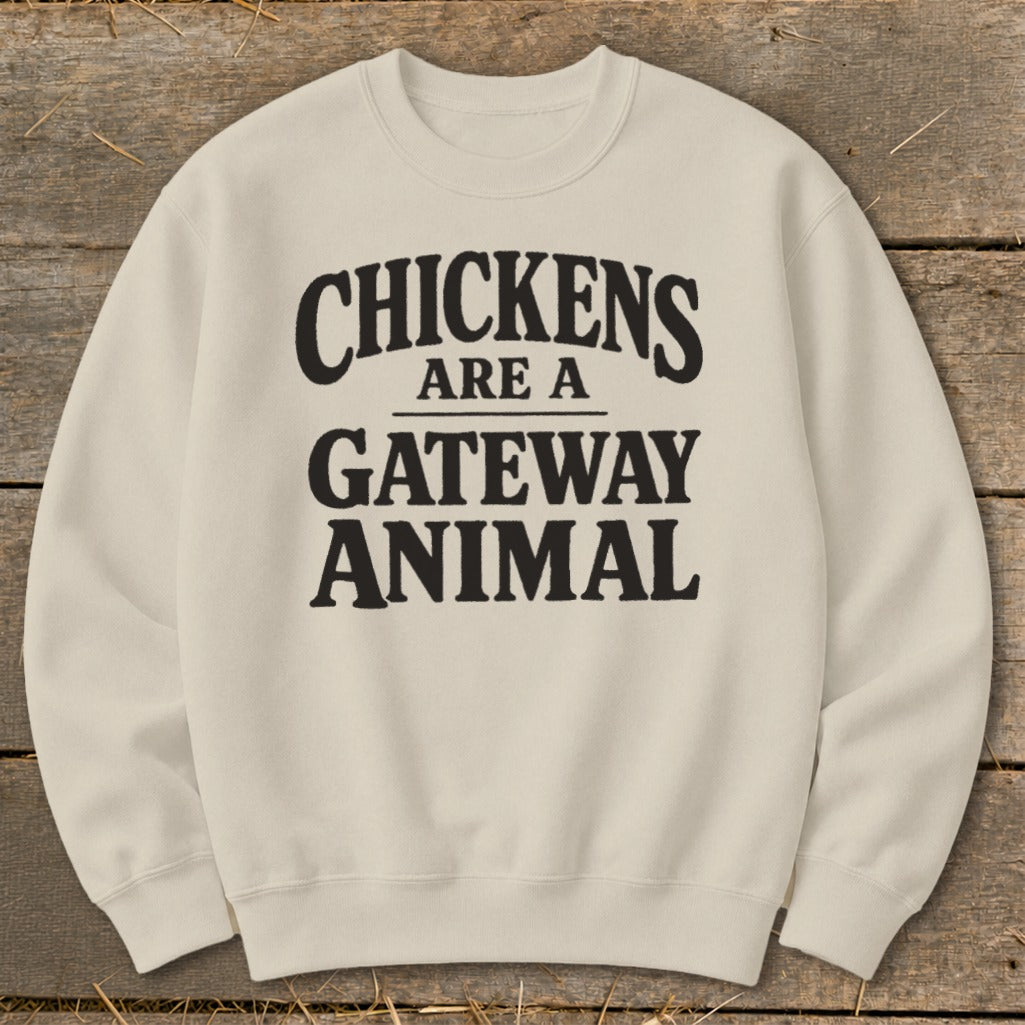 Cream sweatshirt with "Chickens are a gateway animal" text in black.