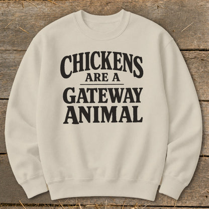 Cream sweatshirt with "Chickens are a gateway animal" text in black.