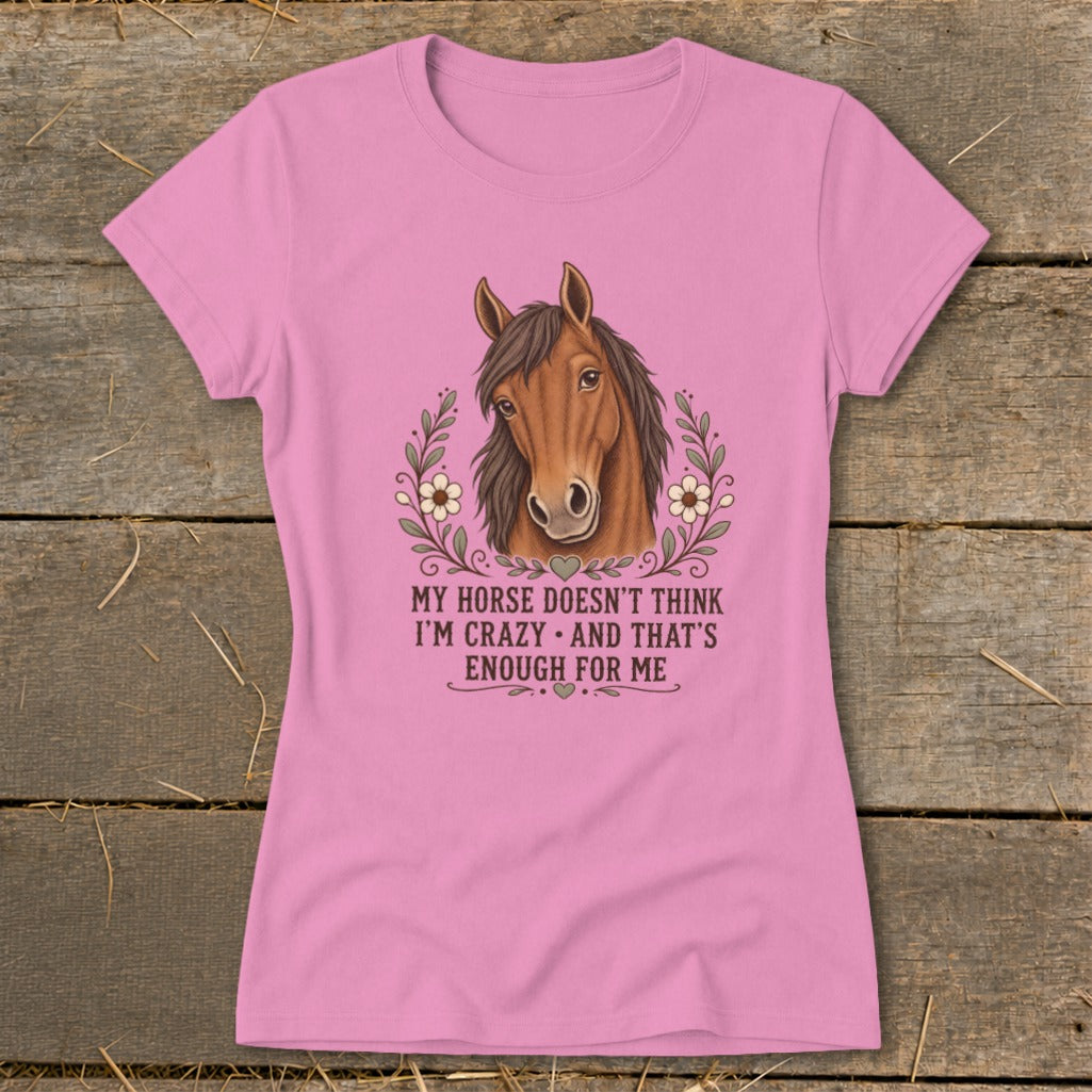 Pink t-shirt with horse graphic and text "MY HORSE DOESN'T THINK I'M CRAZY AND THAT'S ENOUGH FOR ME".