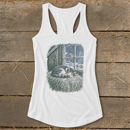 White tank top with a print of a sleeping cat on hay in front of a snowy barn window.