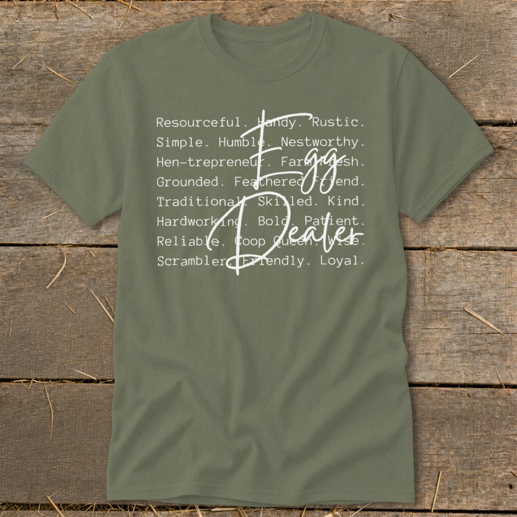 Olive green t-shirt with "Egg Dealer" and descriptive words.