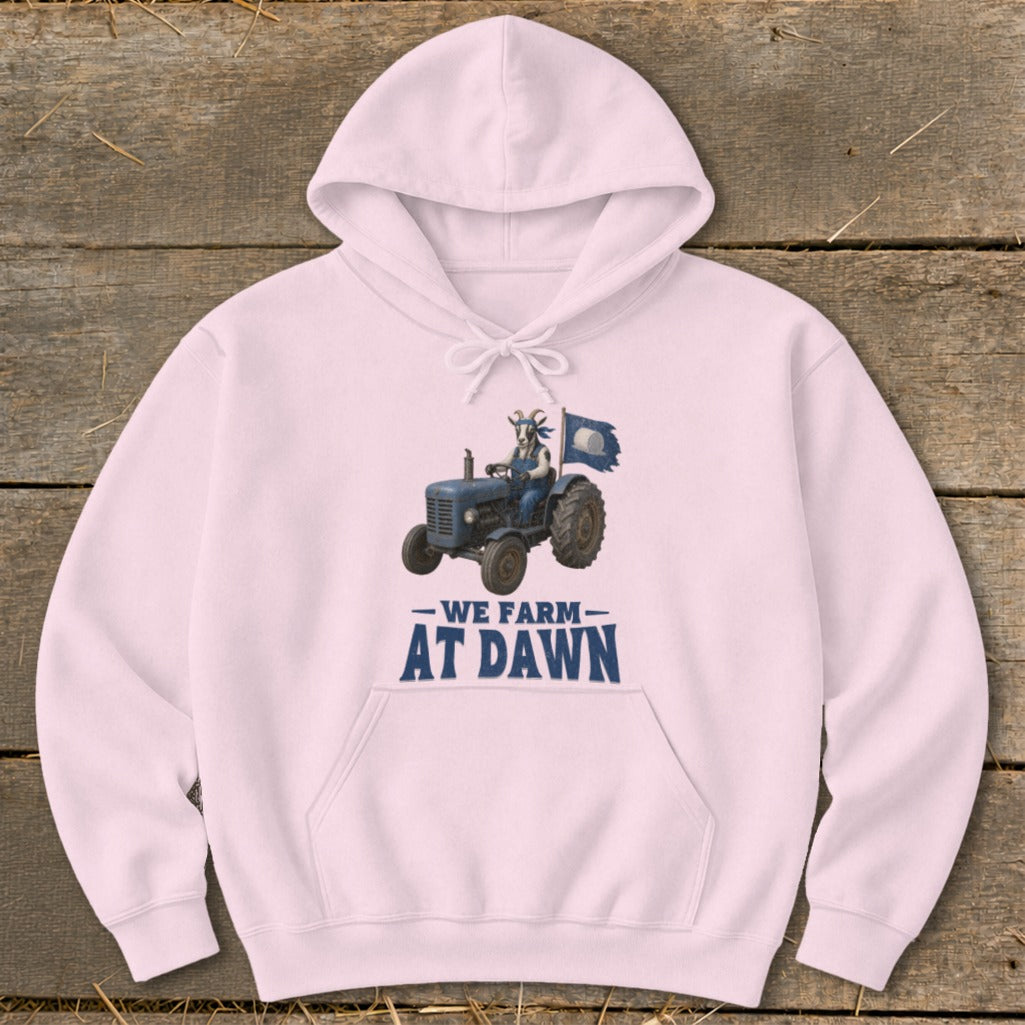 Pink hoodie with "We Farm At Dawn" text and graphic of goat on a tractor.
