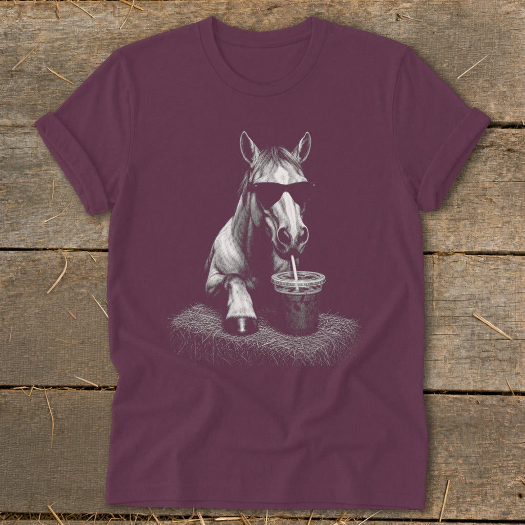 Burgundy t-shirt with a graphic of a horse wearing sunglasses drinking from a cup.