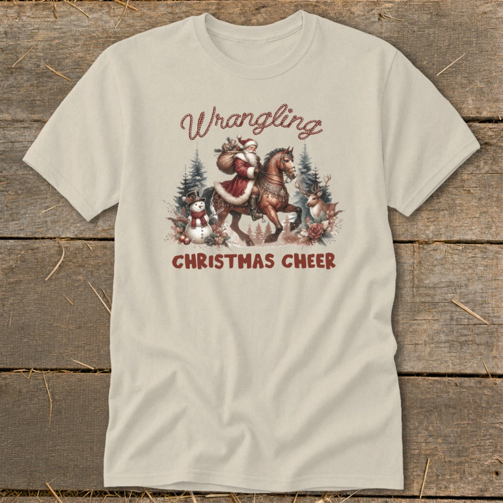 Santa on horseback with a snowman and reindeer, text says "Wrangling Christmas Cheer".