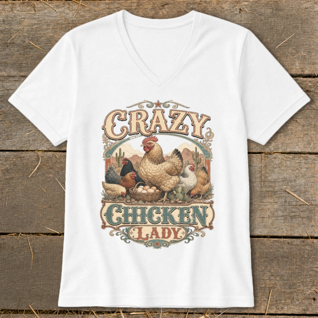 White t-shirt with "Crazy Chicken Lady" text and illustration of chickens in a desert landscape.