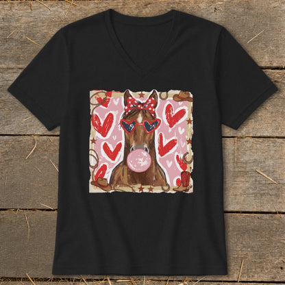Horse with heart sunglasses and bow blowing bubble gum, surrounded by hearts and western motifs.