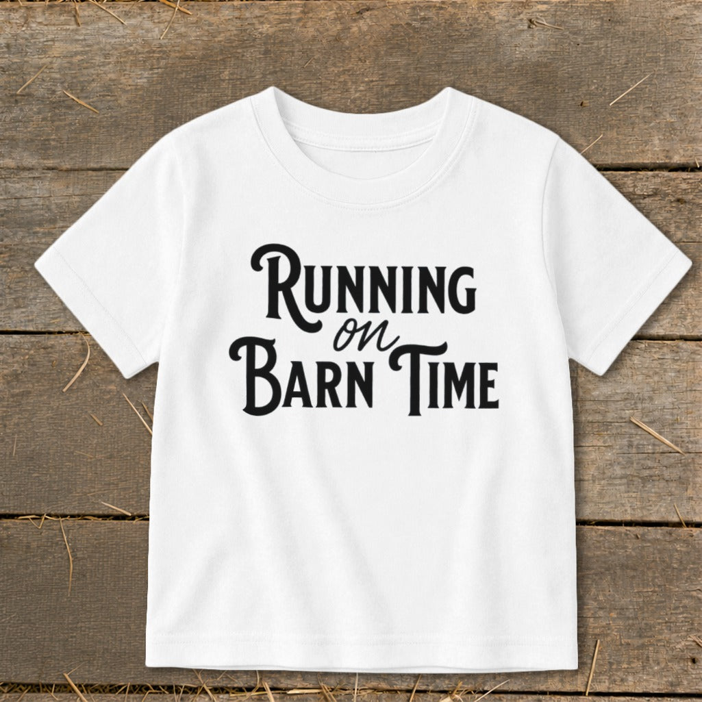 White t-shirt with "Running on Barn Time" text in black lettering.