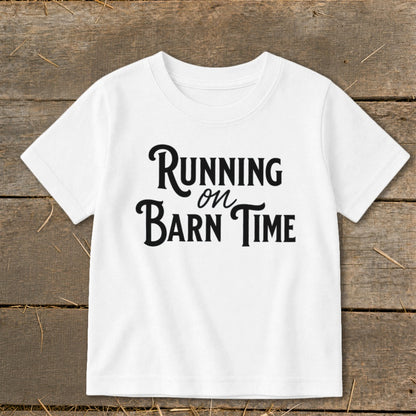 White t-shirt with "Running on Barn Time" text in black lettering.