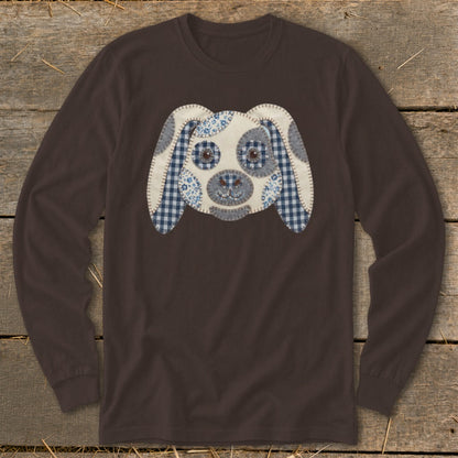 Long-sleeve brown shirt with a patchwork dog face applique.