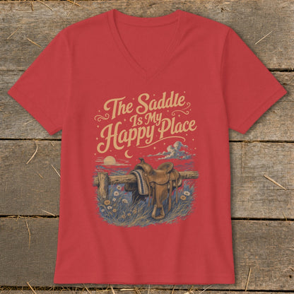 Red v-neck t-shirt with "The Saddle Is My Happy Place" and western saddle graphic.