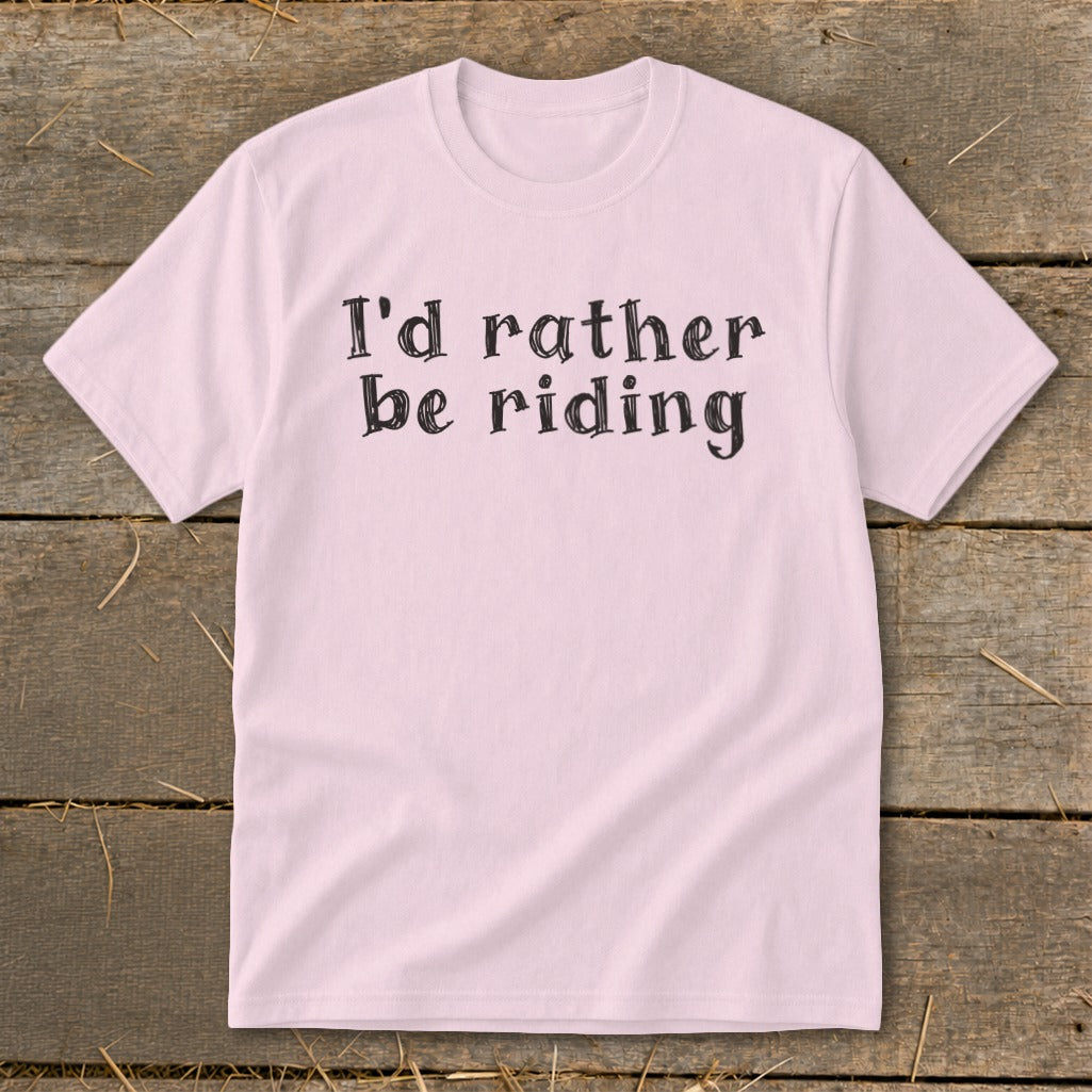 Pink t-shirt with black text reading "I'd rather be riding."