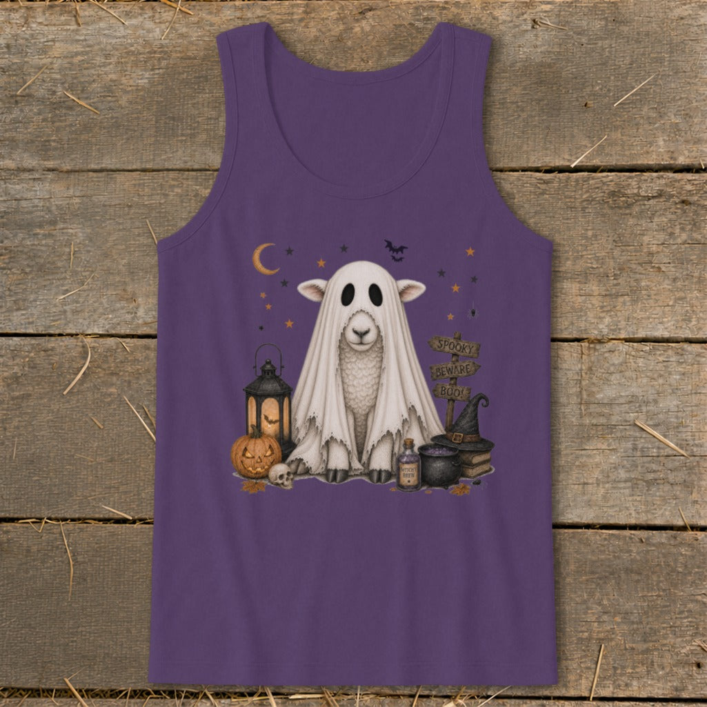 Sheep dressed as a ghost with Halloween decorations and "Spooky Beware Boo!" sign.
