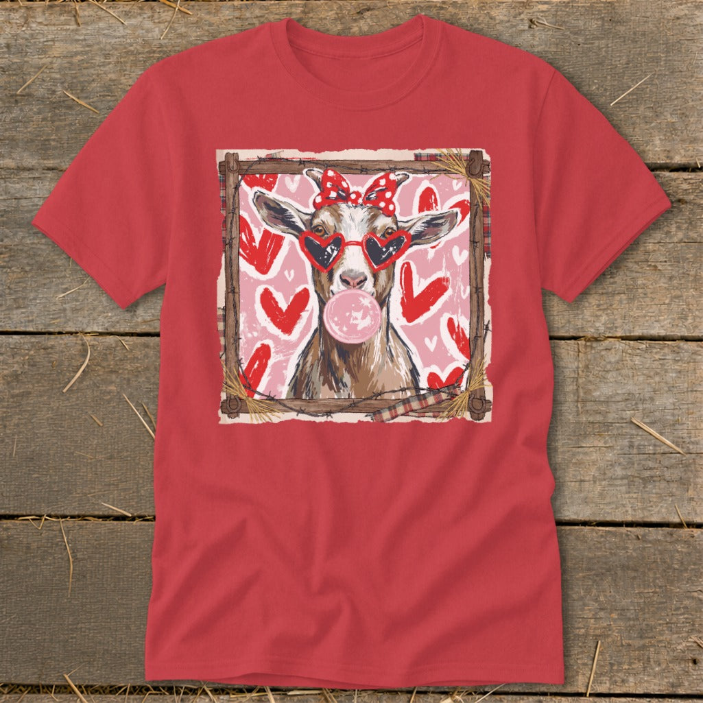 Goat wearing heart sunglasses and bow, blowing bubblegum, with hearts background.