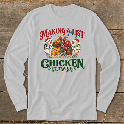 Christmas chickens wearing Santa hats and scarves with text "Making a list, chicken it twice".