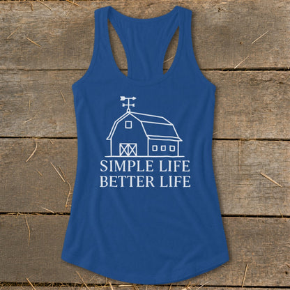 Blue tank top with white barn graphic and text "SIMPLE LIFE BETTER LIFE".